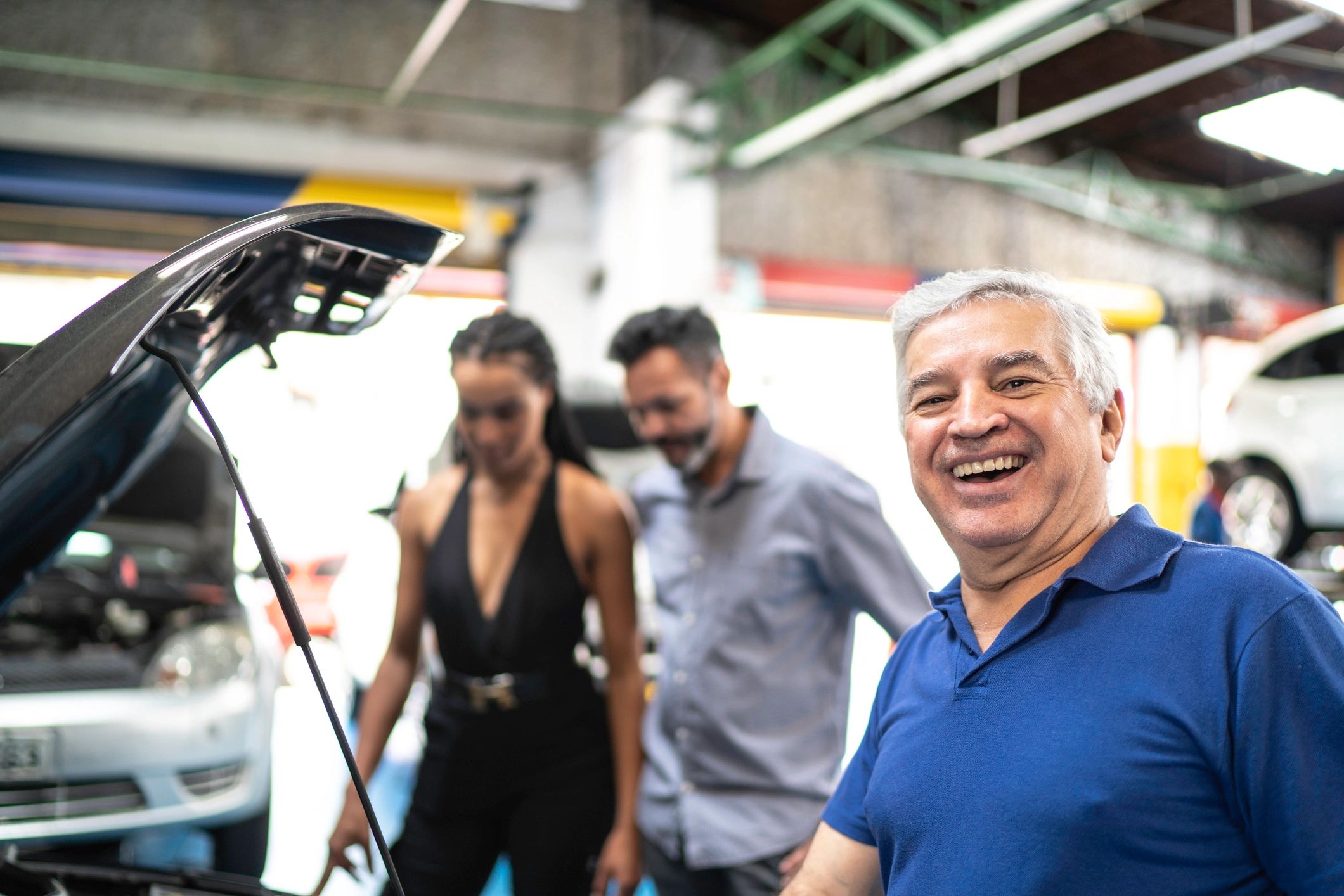 happy customer at auto repair shop