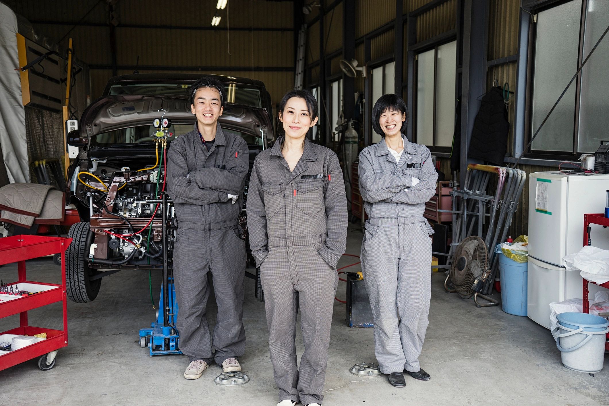 Japanese auto mechanic in workshop